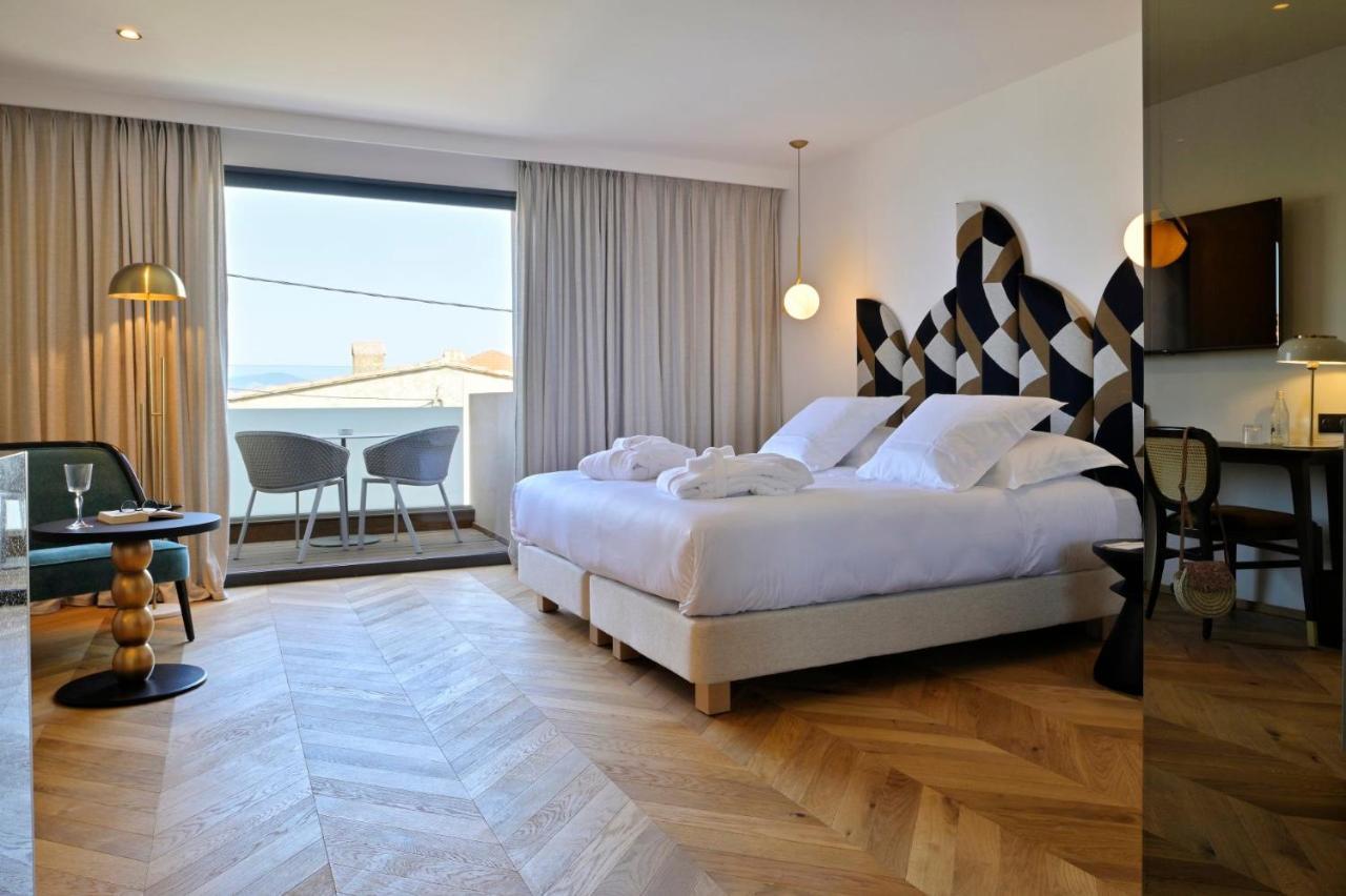 Hotel & Spa Rocabella เอลเลอรูซ ภายนอก รูปภาพ